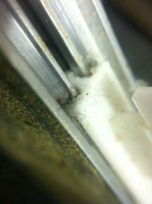 This is the kind of crud that you'll find. This is dust buildup around the fader slider.