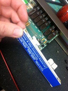 Next, remove the fader's mounting screws